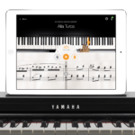 Learn to play piano with flowkey